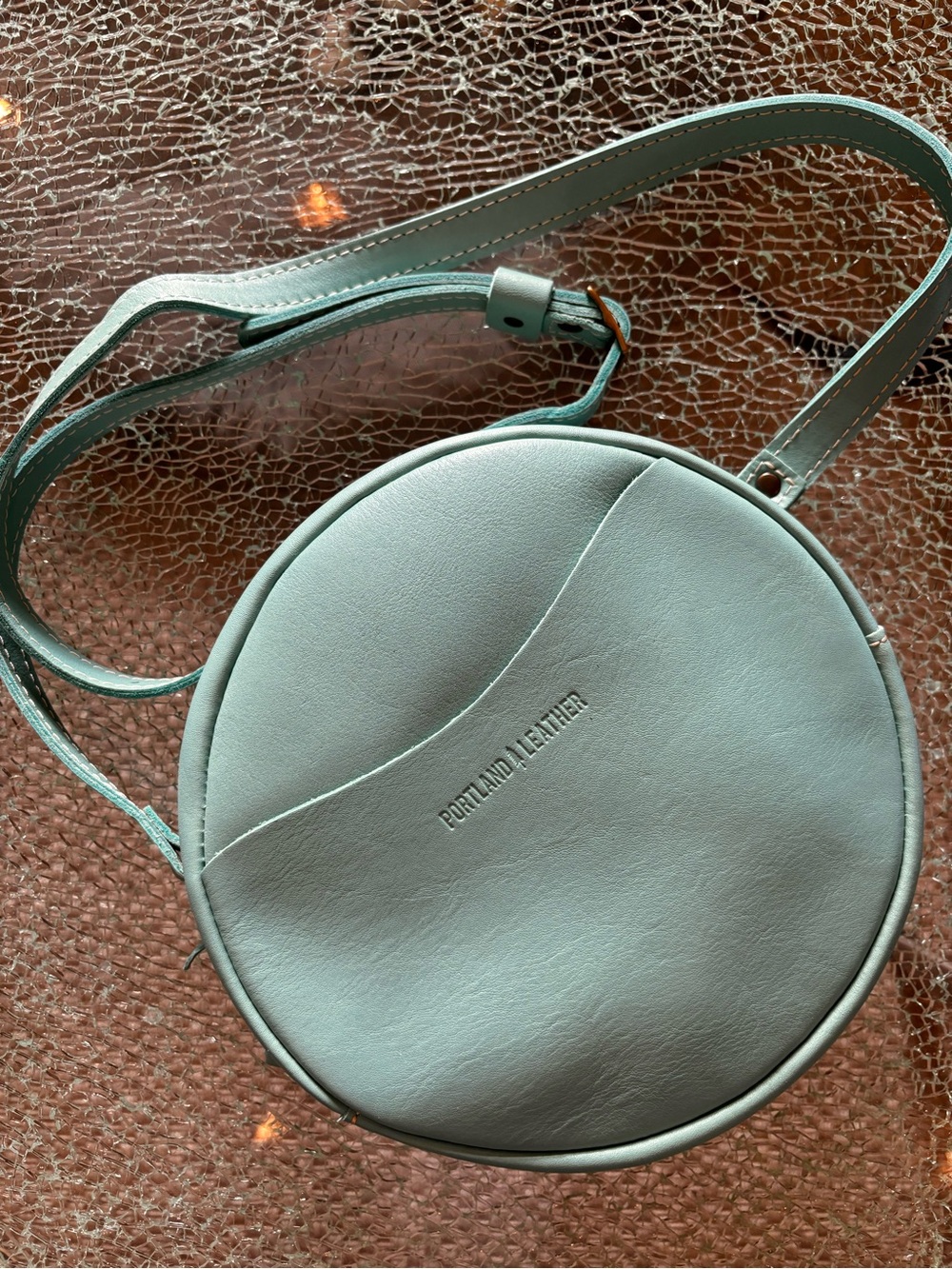 Portland Leather tiffany blue Round Crossbody bag gold/brass tone zipper/buckle